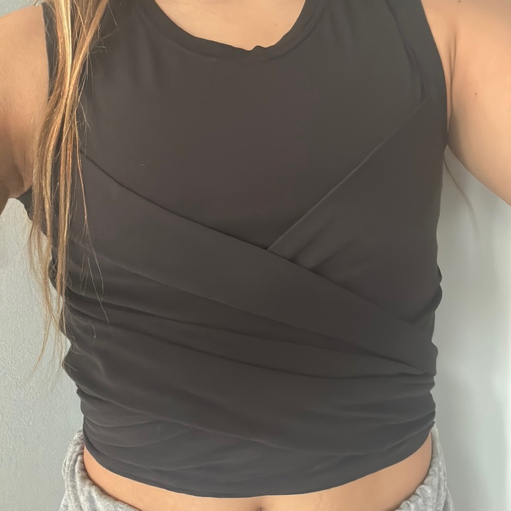 Barley worn Lulu lemon crop tank top that ties in back